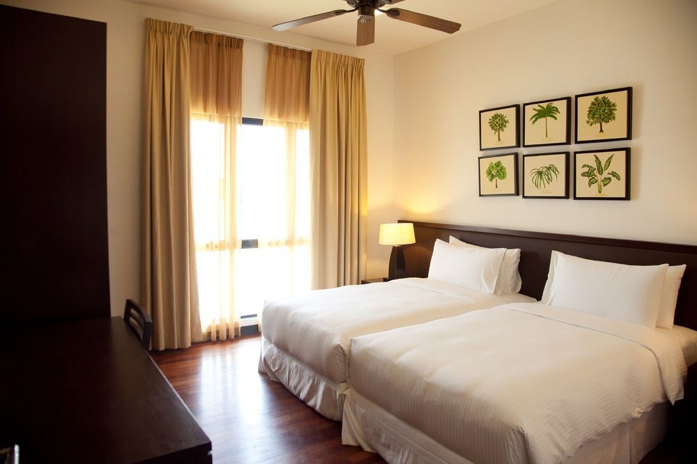 Avani Sepang Goldcoast Resort Kampong Bagan Lalang Kültér fotó A bedroom at the hotel